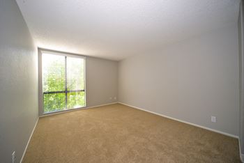 4250 Coldwater Canyon unfurnished bedroom with window
